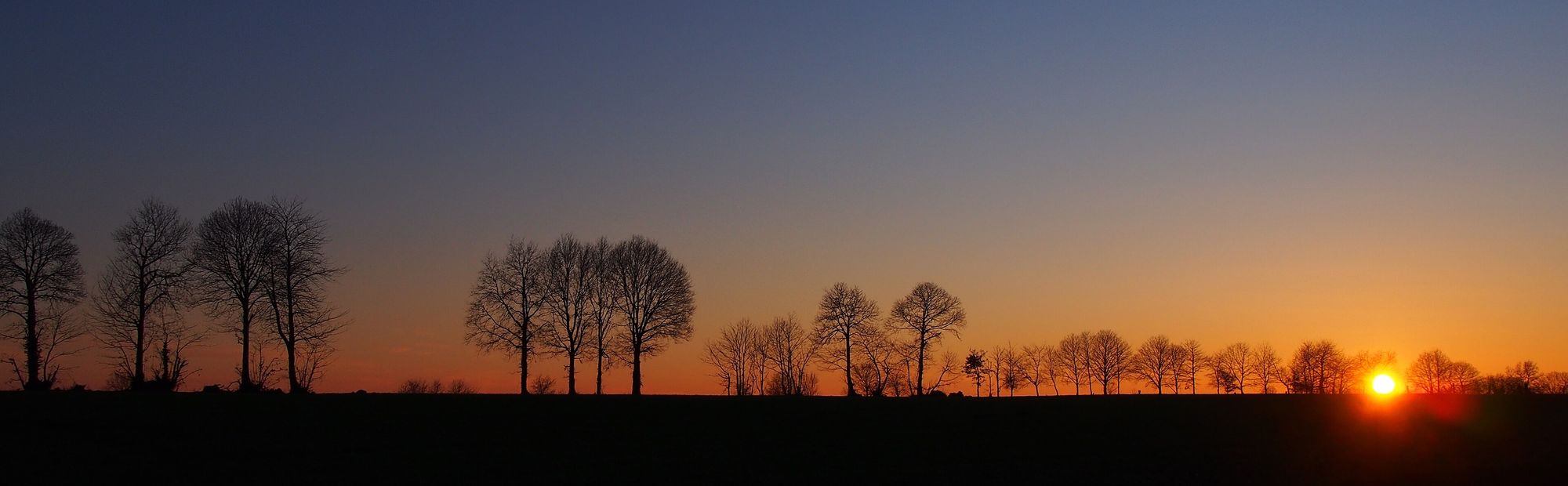 Coucher de soleil sur la campagne normande